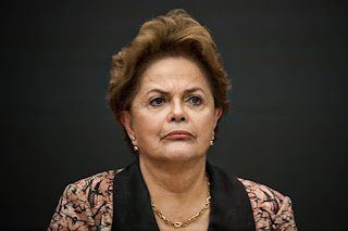 Em evento, Dilma condena sanções à Rússia e critica Bolsonaro