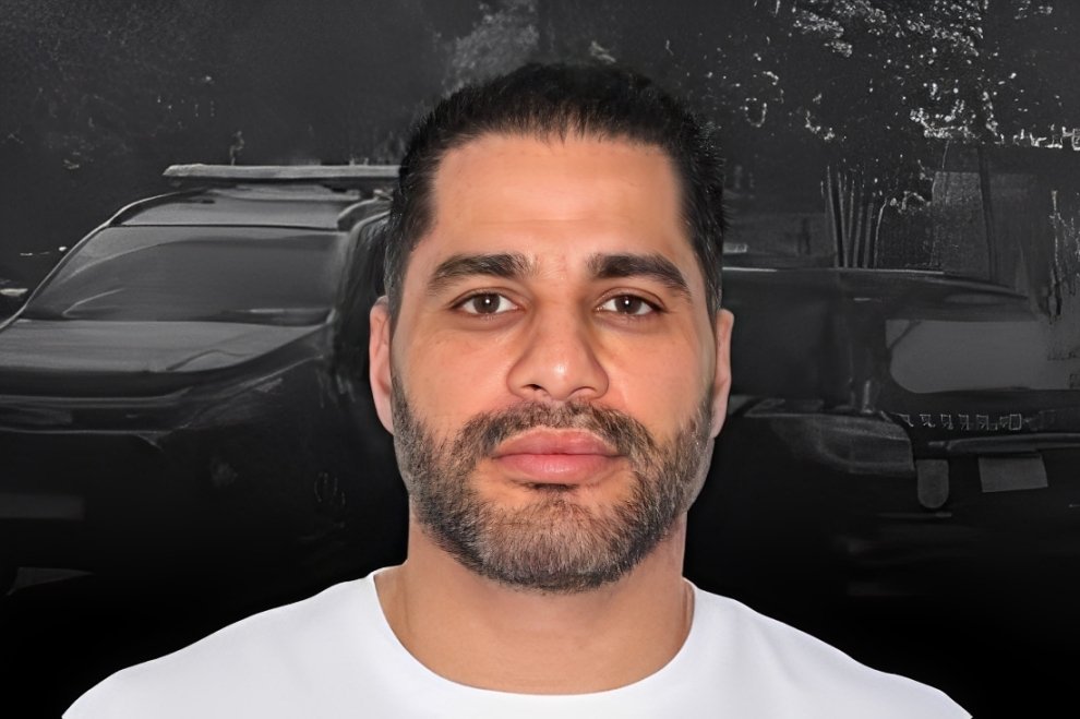 Retrato de identificação de Luiz Phillipi Machado de Moraes Mourão, conhecido como Sicário. Ele aparece de forma neutra para registro oficial.