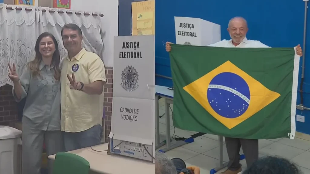 Colagem de duas fotos mostrando políticos brasileiros votando. À esquerda, Jair Bolsonaro e Michelle Bolsonaro sorriem e fazem o sinal de "V" ou "22" com as mãos ao lado de uma cabine de votação. À direita, Lula sorri enquanto segura uma grande bandeira do Brasil atrás de uma cabine de votação da Justiça Eleitoral.