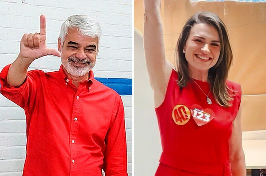 Humberto Costa sorrindo com camisa vermelha fazendo gesto de L com os dedos e Marília Arraes sorrindo vestindo regata vermelha com botões de campanha, celebrando a vitória nas eleições para o Senado por Pernambuco.