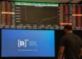 Mercado reage positivamente ao resultado do primeiro turno, Bolsa dispara e dólar cai para R$ 5